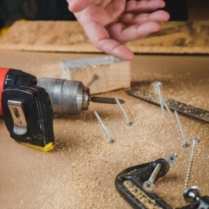 black and red cordless hand drill